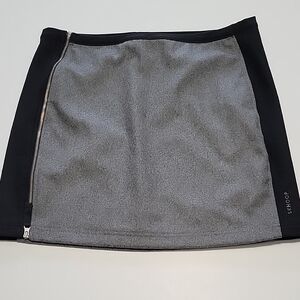 SKHOOP Patsy mini skirt with asymmetrical style, size M.